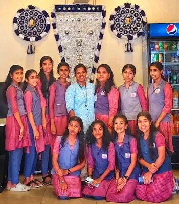 Students with the Hotel CAPS team as part of a local school sponsorship initiative