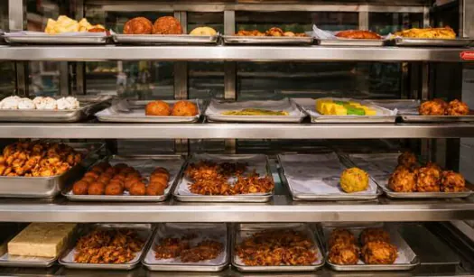 Hotel CAPS buffet counter with a variety of freshly prepared dishes