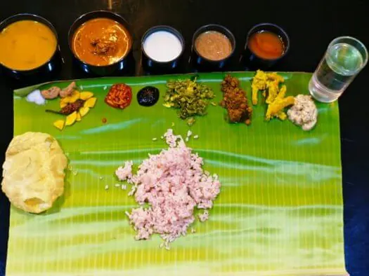 Traditional Kerala meals served on a banana leaf