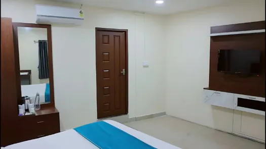Spacious Hotel CAPS room with television, air conditioning and furnished interior